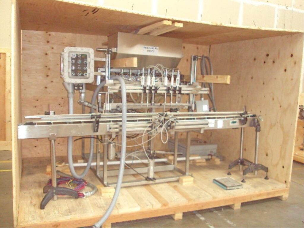 One used IVS- REB Inc. IVS-6 In-Line Six Cylinder Piston Head Filling System